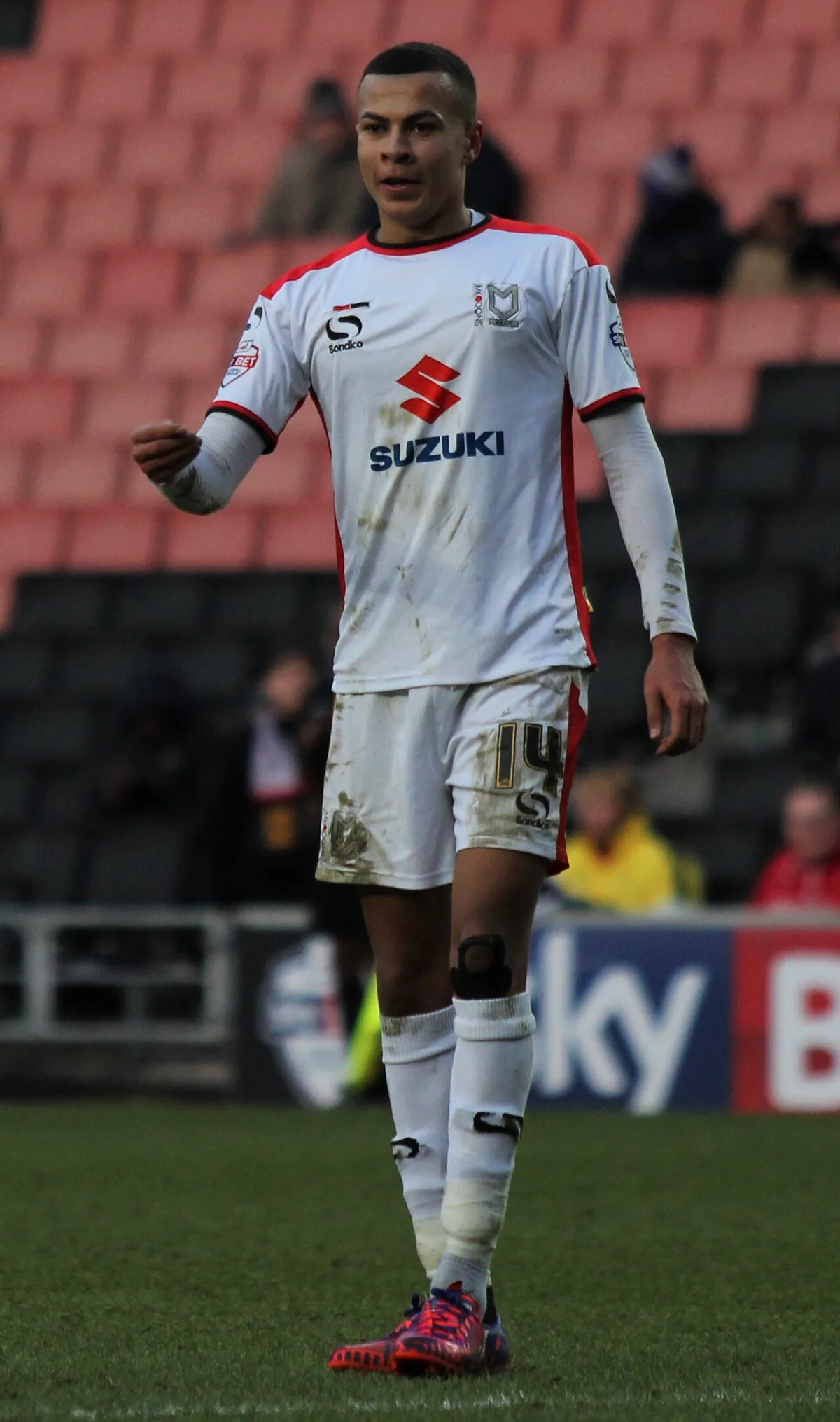 Dele Alli playing for MK Dons against Barnsley in January 2015