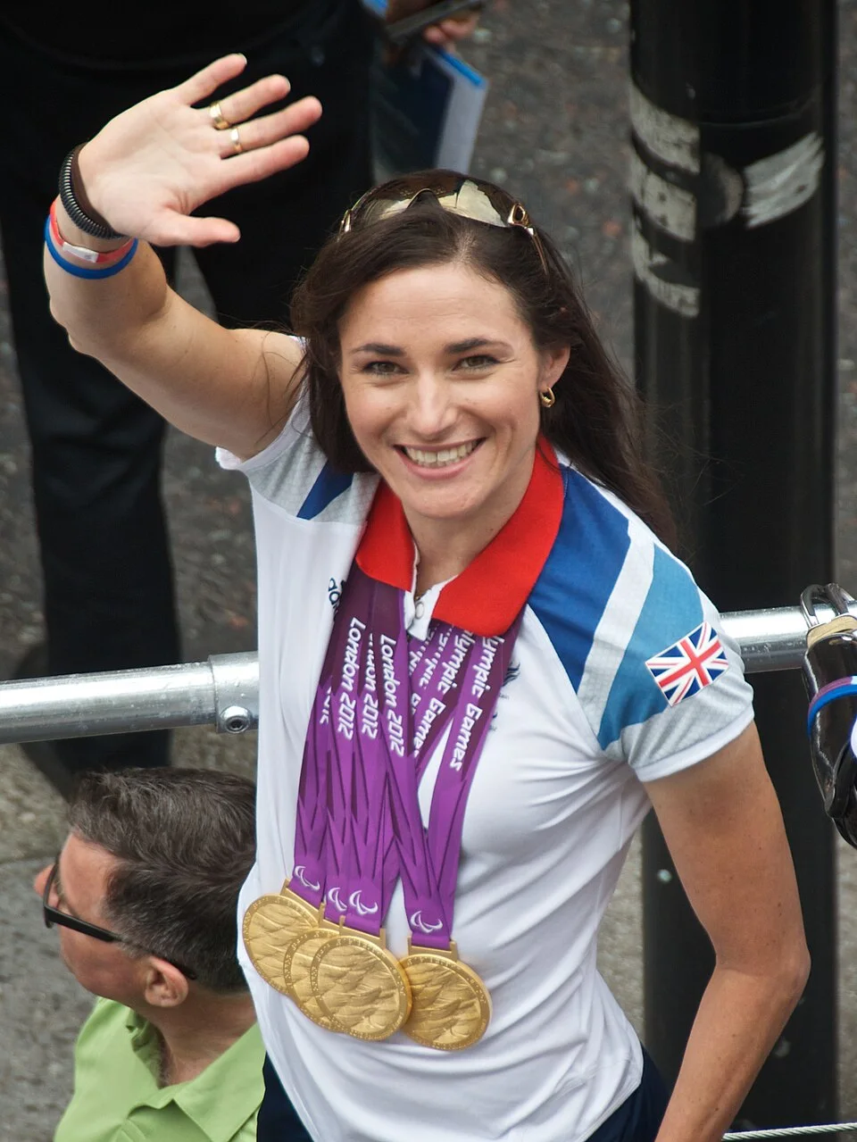 Sarah Storey with her Paralympic gold medals at the London 2012 victory parade